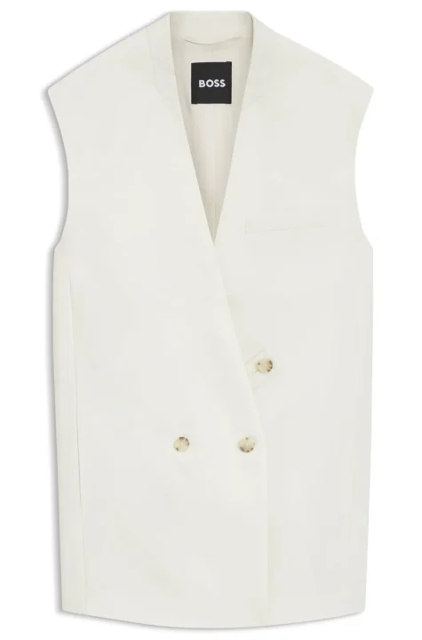 オフホワイトのノースリーブダブルブレストベスト