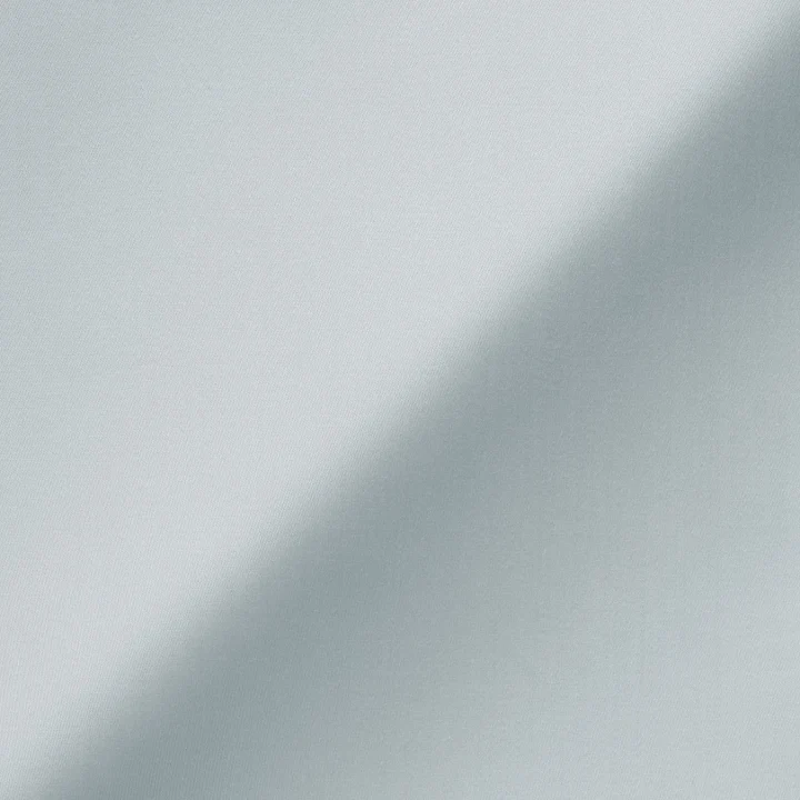 水色と灰色の中間のような色の布地のテクスチャ画像