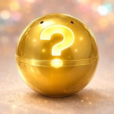 中央に光る白いクエスチョンマークが描かれた金色の球体